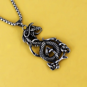Viking dragon pendant necklace in polished stainless steel with Celtic knot dragon scales