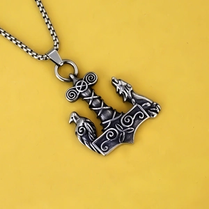 Vintage stainless steel Mjolnir pendant necklace featuring Viking crow and wolf carvings
