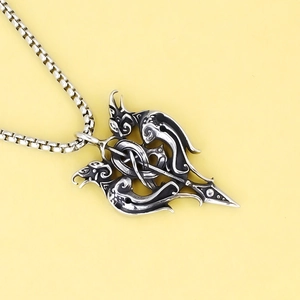 Collier vintage en acier inoxydable avec pendentif double perroquet sur chaîne maille