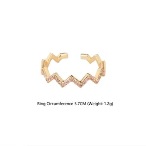 Gold-plated wave ring with purple zircon stones and adjustable open band design