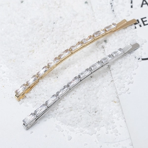 Elegant zircon hair clip set in gold and silver finish with rectangular stones