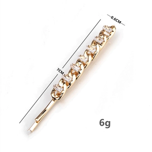 Elegant 7cm gold chain hair clip with rectangular zircon stones on white background