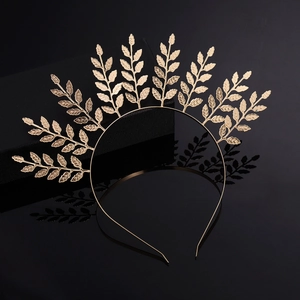 Golden olive leaf tiara crown in Greek style with metallic texture for bridal wear