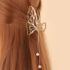 Pince à cheveux papillon dorée élégante avec de longs glands perlés pour femmes