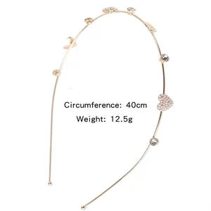 Elegant gold metal headband with pearl heart design and rhinestones, 40cm circumference