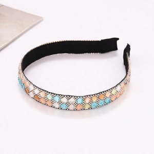 Sparkling crystal headband with colorful rhinestones and sequins on a black base