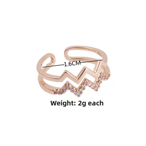 Detail of rose gold double-layer zigzag ring with pave zircons and adjustable opening