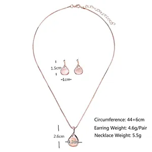 Parure de bijoux en or rose avec collier à pendentif pierre œil-de-chat rose et boucles