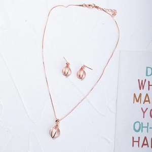 Elegant rose gold jewelry set with pink cat eye stone necklace and matching earrings