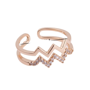 Double layered wave ring in rose gold finish with cubic zirconia stones and open design