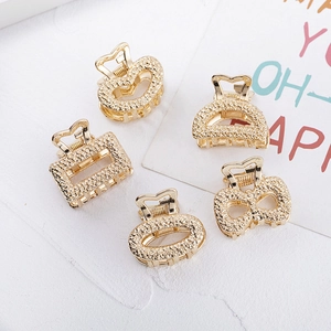 Five-piece set of elegant gold mini alloy hair claws with textured hammered finish