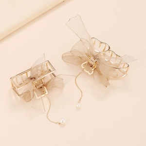 Elegant gold metal hair claw clips with organza bows and delicate pearl tassel charms