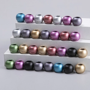 Colorful metallic finish dreadlock beads and hair jewelry rings on display stand