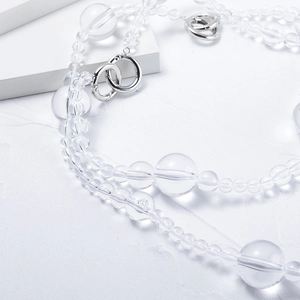 Minimalist pearl choker necklace with transparent beads and polished silver clasp