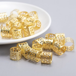 Golden hollow floral hair rings for braids with intricate geometric metal plating patterns