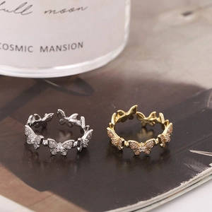 Anelli a farfalla alla moda in oro e argento con pietre di zircone scintillanti