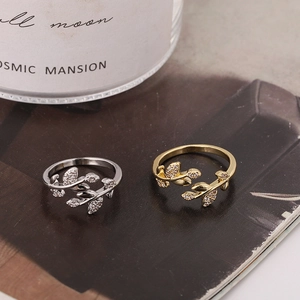 Leaf design open adjustable rings in gold and silver with sparkling cubic zirconia