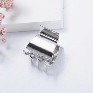Minimalist silver metal hair claw clip with mirror polish finish for high ponytail styling