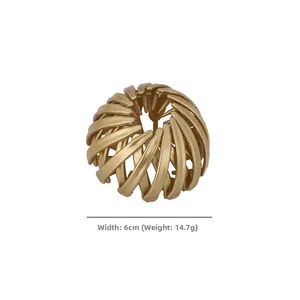Detail view of gold matte bird nest hair clip showing 6CM width and 14.7g weight