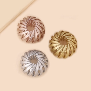 Three expandable bird nest hair clips in rose gold, champagne gold, and silver finishes