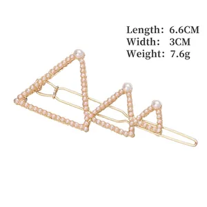 Pince à cheveux triangle géométrique dorée avec perles et design minimaliste coréen