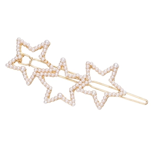 Elegant gold alloy star hair clip featuring white imitation pearls in a layered star design