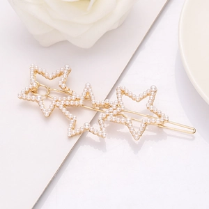 Elegant gold hollow star hair clip with pearls for a minimalist Korean fashion style