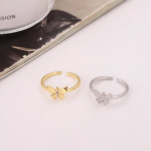 Bague papillon ajustable élégante avec zircons brillants en finitions or et argent