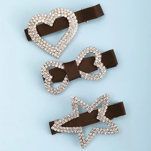 Lot de trois barrettes à cheveux marron foncé avec strass en forme de cœur et nœud