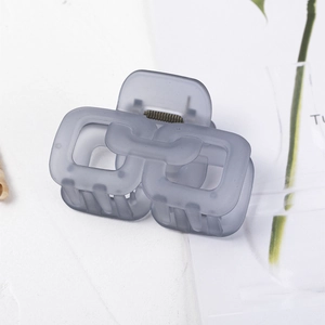 Elegant matte grey-blue rectangular hollow hair claw clip with modern minimalist design