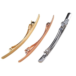 Vue détaillée de longues barrettes en métal finitions or, or rose et argent