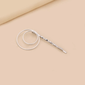 Barrette à cheveux minimaliste en argent avec cercles concentriques et style géométrique