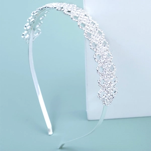 Close-up of sparkling rhinestone bridal headband with elegant silver alloy frame