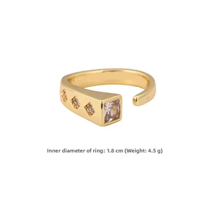 Detail showing the 1.8cm inner diameter and 4.5g weight of the geometric gold ring
