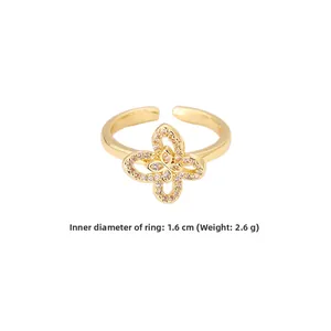 Detailansicht Goldring mit Blumen-Schmetterlings-Design, Zirkonia und 1,6cm Durchmesser