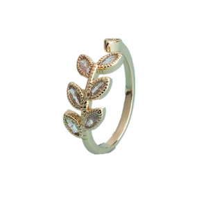 Elegant gold leaf open ring with marquise-cut zircon stones on a white background