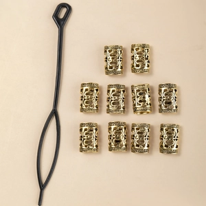 Set of 10 golden vintage dreadlock beads with hollow patterns and black hair tool