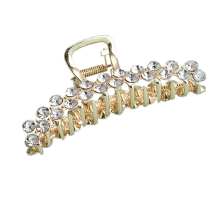 Eleganter Haargreifer aus Goldmetall mit funkelnden Strasssteinen im Halbmond-Design