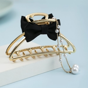Elegant gold metal shark hair clip with black mesh bow and dangling pearl tassels