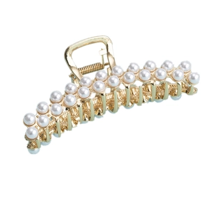 Elegant gold metal hair claw clip with double rows of pearls in a minimalist French style