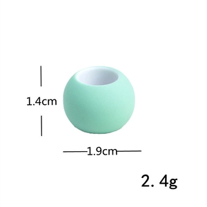 Detail view of mint green large hole bead for DIY hair accessories showing 1.9cm x 1.4cm size