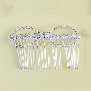 Close-up of alloy hair comb with sunflower rhinestone details for bridal hair styling