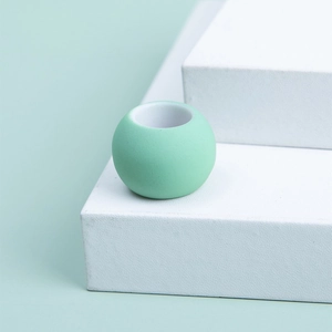 Mint green matte large hole bead on white display stand for DIY braids and crafts