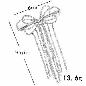 Silver bow hair clip with rhinestone tassels dimensions 6cm by 9.7cm and weight 13.6g