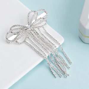 Elegant silver bow hair clip with crystal rhinestones and long tassel fringe pendants