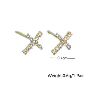 Minimalist gold-plated X-shape stud earrings with shimmering zircon stones for women