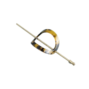 Detail of tortoise shell acetate hair slide with a minimalist gold metal hairpin