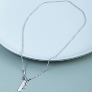 Minimalist double-layered asymmetric titanium steel necklace with engraved FILLETTE pendant