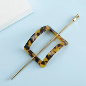 Elegant tortoise shell acetate hair fork with gold metal pin for minimalist hair styling