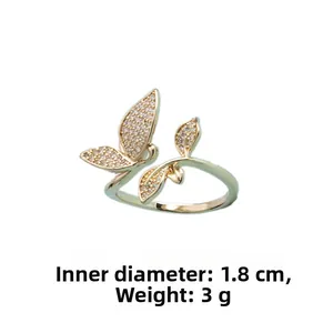 Detail view of butterfly open ring with pave cubic zirconia weighing 3g and 1.8cm diameter